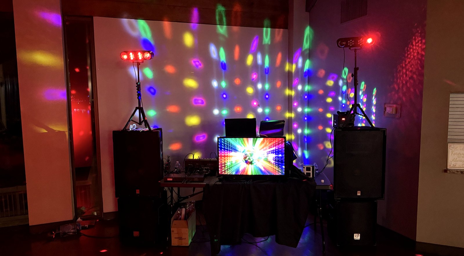 DJ Rob Rocks lighting and sound setup at a reception